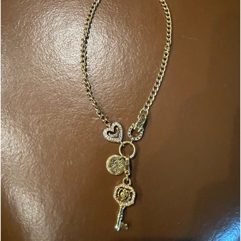 Juicy gold charm necklace with added key charm